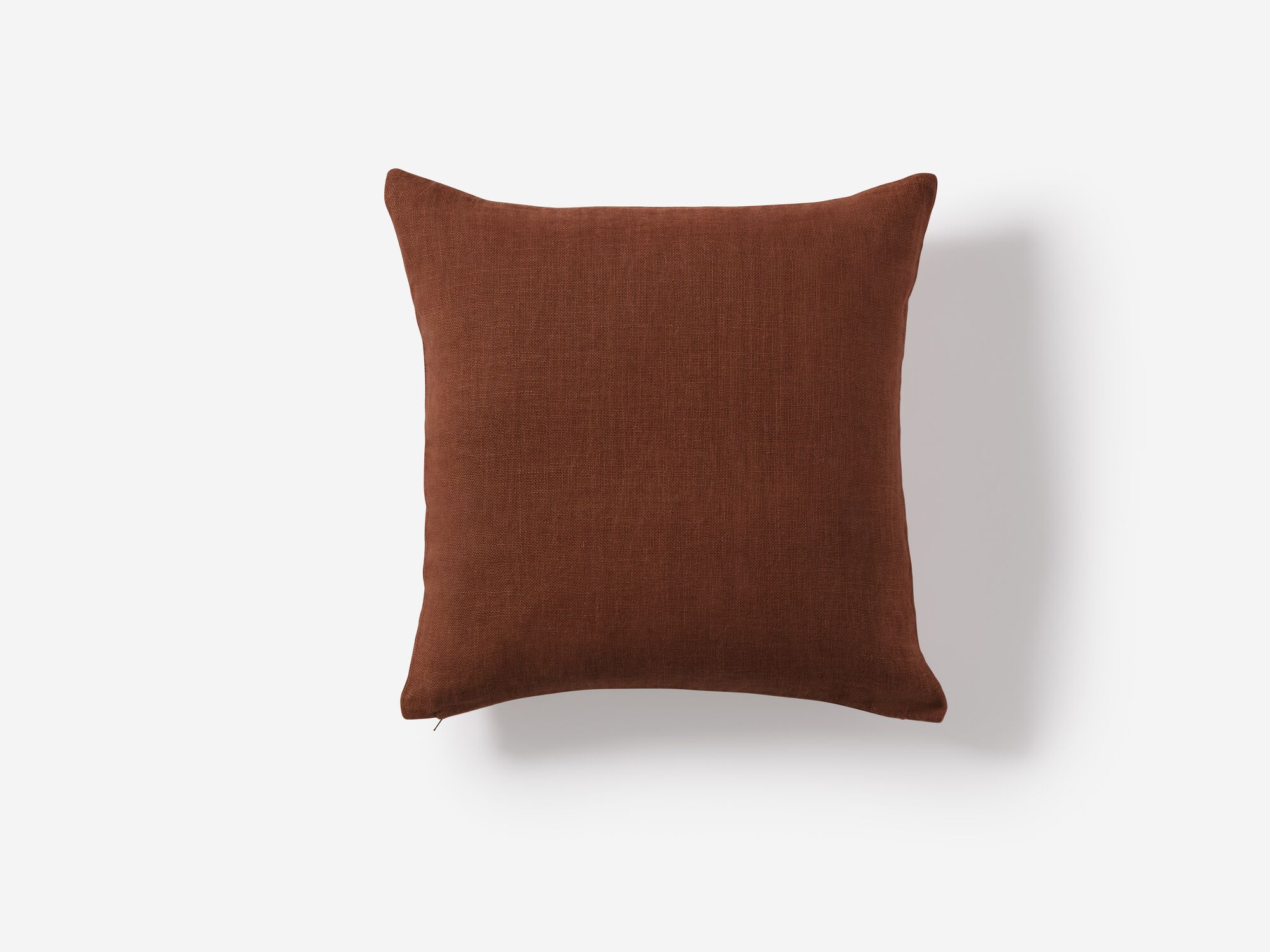 Top view of red linen throw pillow